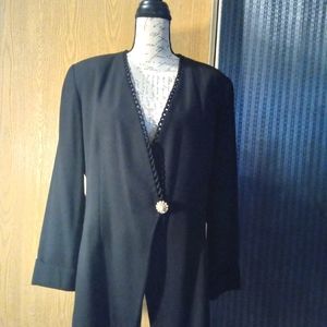 Kasper office jacket in black color with a large gold button.